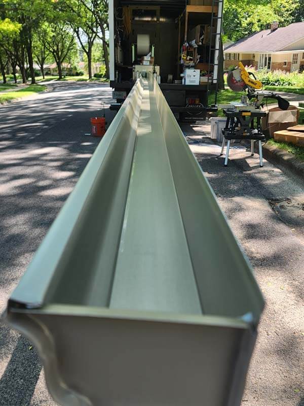 Rolling Out 5 inch Seamless Aluminum Gutters Madison Wi